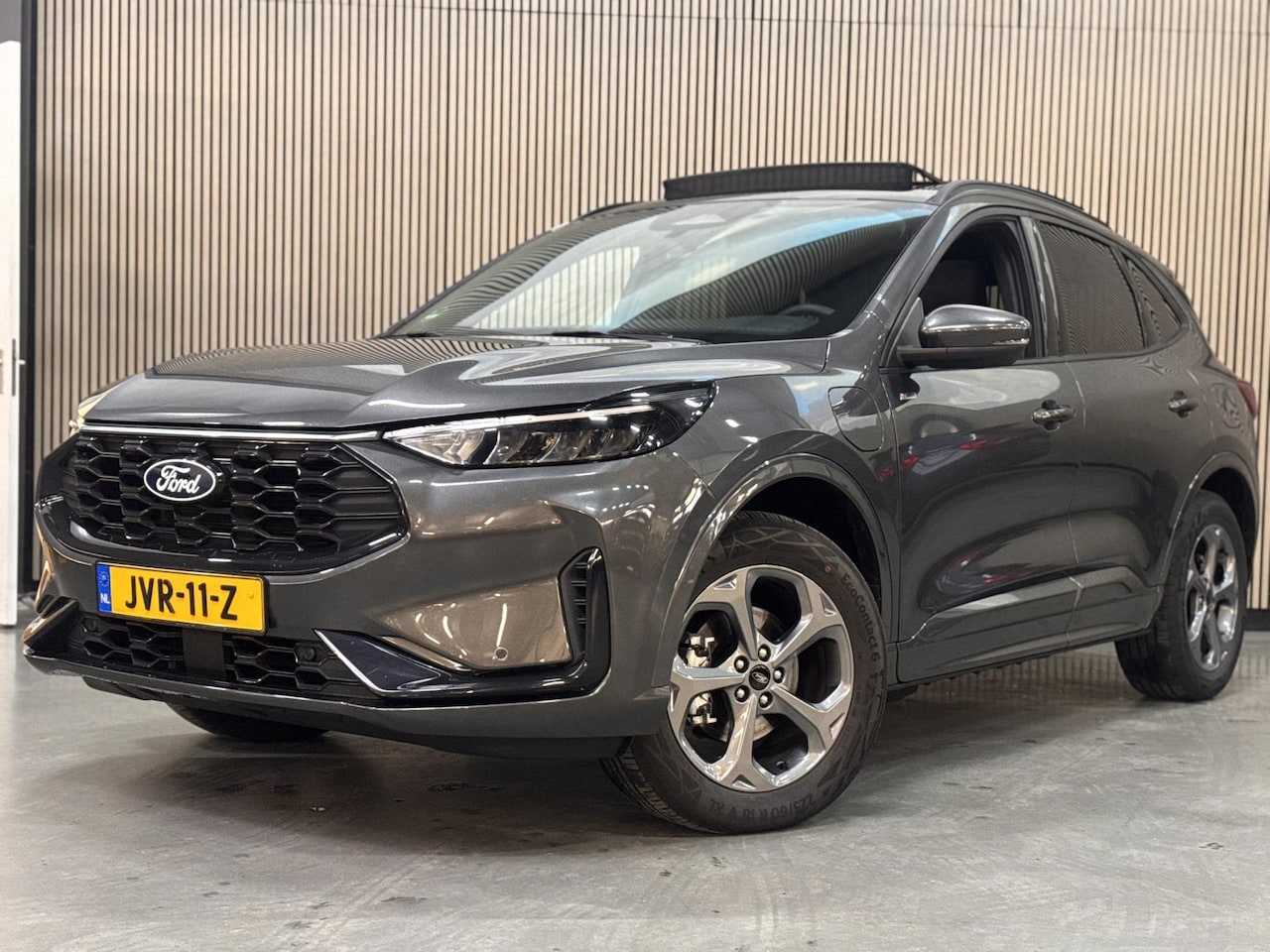 Ford Kuga - 2.5 PHEV ST-Line Panoramadak Trekhaak Winter pack Camera Fabrieksgarantie tot 3-6-2027 - AutoWereld.nl