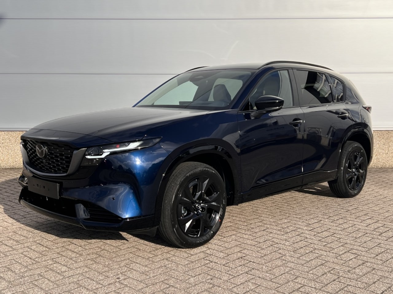 Mazda CX-5 - 2.5 141pk Homura Tan lederen interieur - AutoWereld.nl