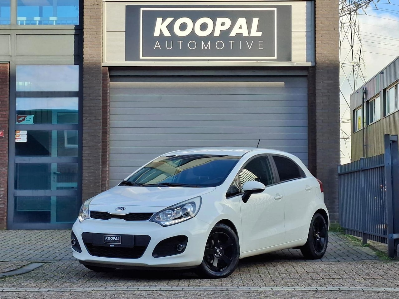 Kia Rio - 1.2 CVVT Super Pack | Keyless | Camera | Clima | NAP - AutoWereld.nl