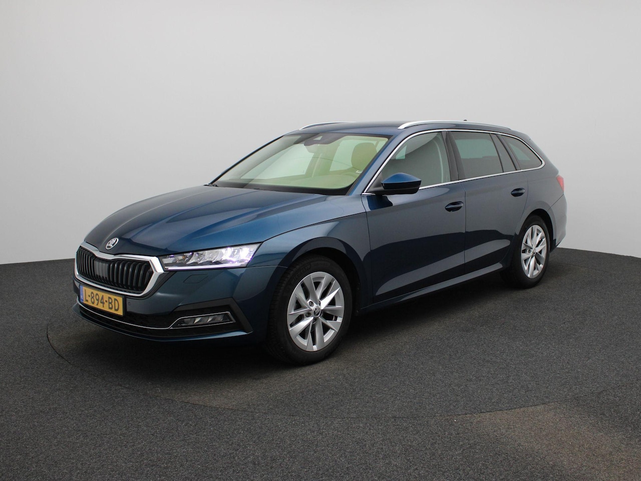 Skoda Octavia Combi - 1.0 e-TSI Business Edition Plus | STOELVERWARMING | ACHTERUITRIJCAMERA | ADAPTIVE CRUISE C - AutoWereld.nl