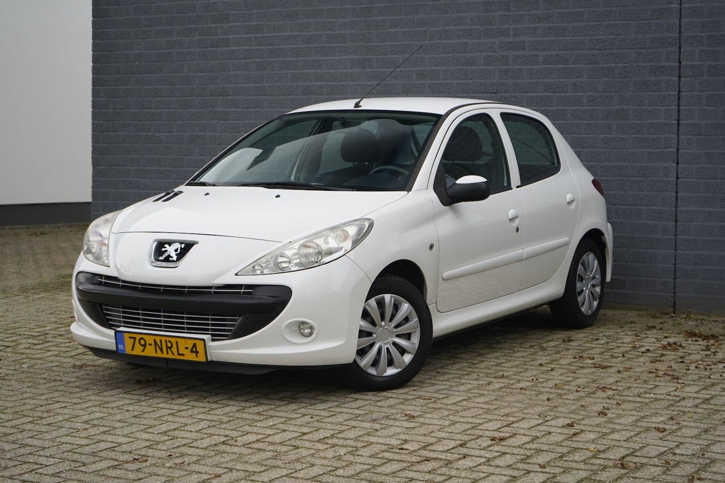 Peugeot 206 - 1.4 Millesim 200, wit, 5 deurs, Airco, NAP - AutoWereld.nl