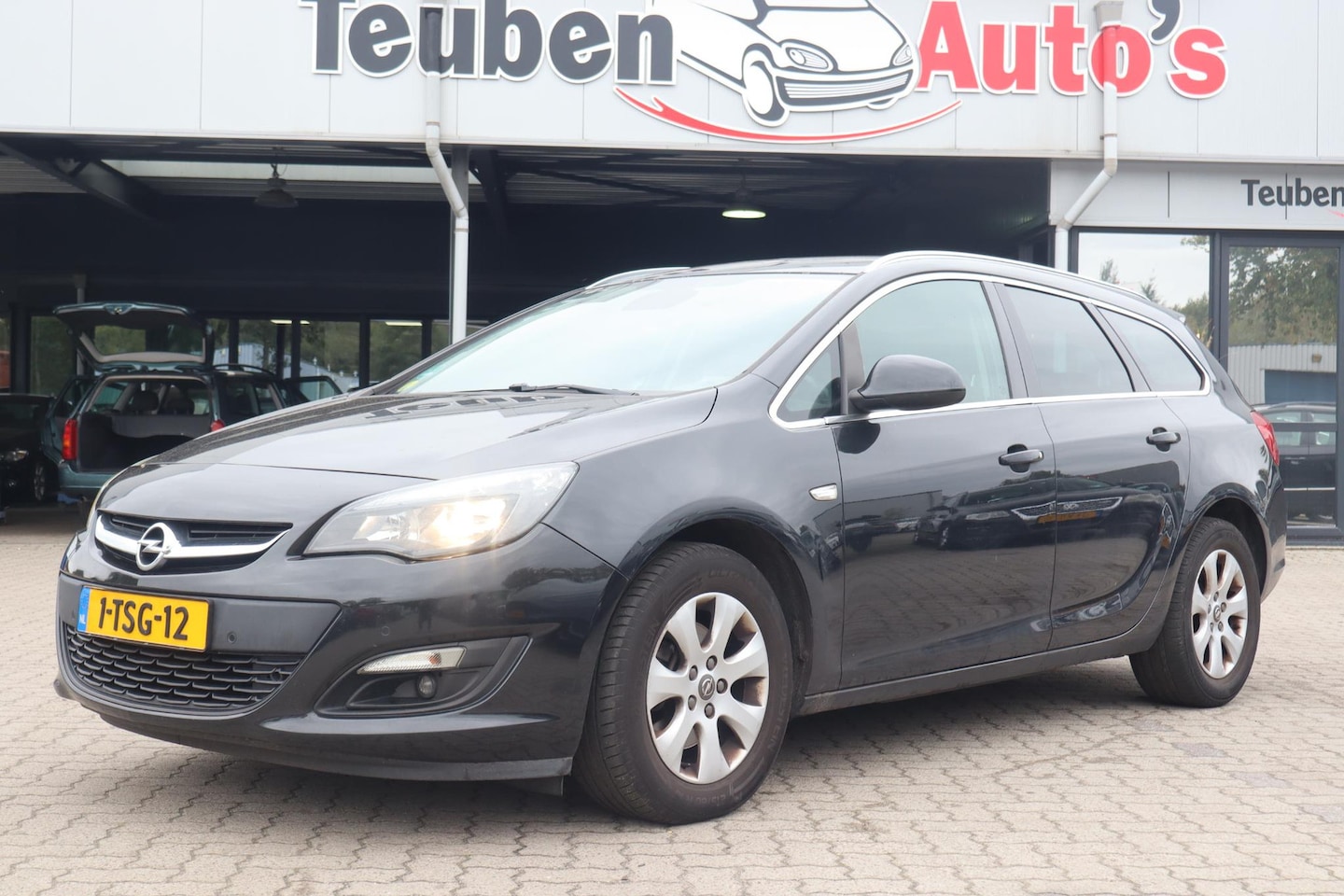 Opel Astra Sports Tourer - 1.6 CDTi Business + | Cruise control | Trekhaak | LM Velgen | Climate control - AutoWereld.nl