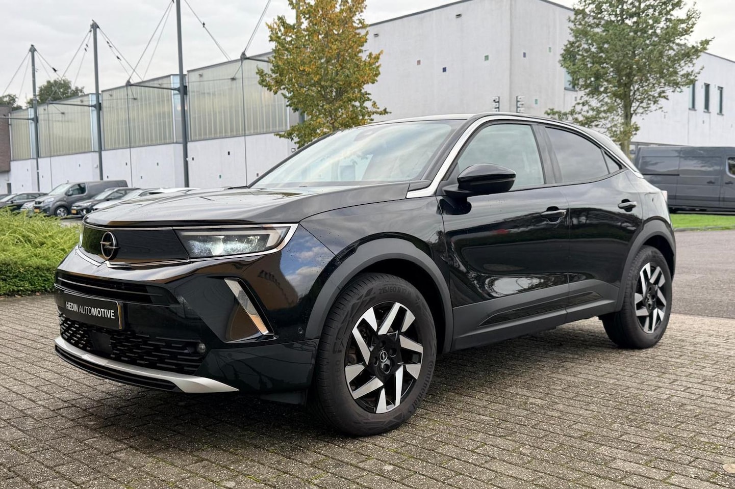 Opel Mokka-e - Elegance 50-kWh 7.4kw bl. Airco | Carplay | Camera | LM velgen | Stoelverwarming | DAB+ | - AutoWereld.nl