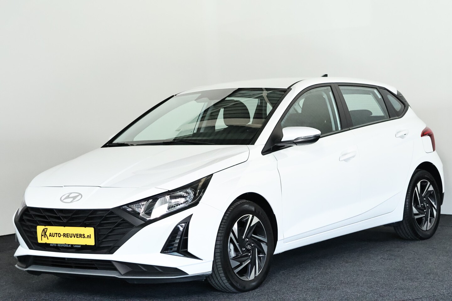Hyundai i20 - 1.2 MPI Comfort / Navi / Airco / CarPlay / Cam - AutoWereld.nl