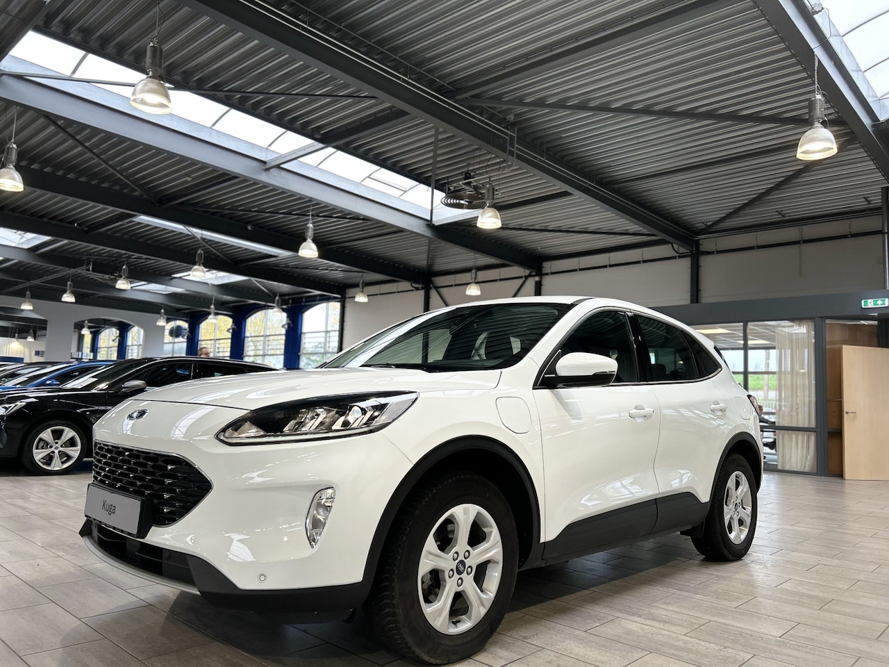 Ford Kuga - 2.5 PHEV Cool & Connect | Trekhaak | Winter Pack | SOH 88,7% | Navi | Clima | Cruise | 4 s - AutoWereld.nl