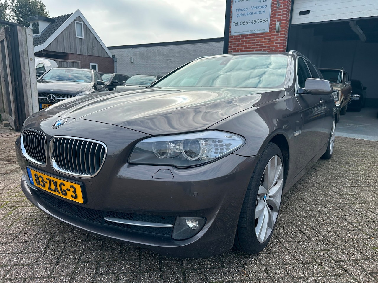 BMW 5-serie Touring - 528i High Executive AUTOMAAT-NAVI-CLIMA-PANORAMADAK - AutoWereld.nl