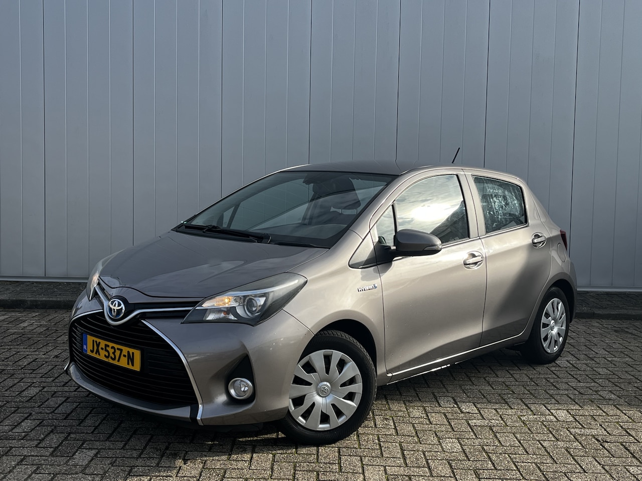 Toyota Yaris - 1.5 Hybrid Aspiration Clima Cruise Dealer onderhouden - AutoWereld.nl