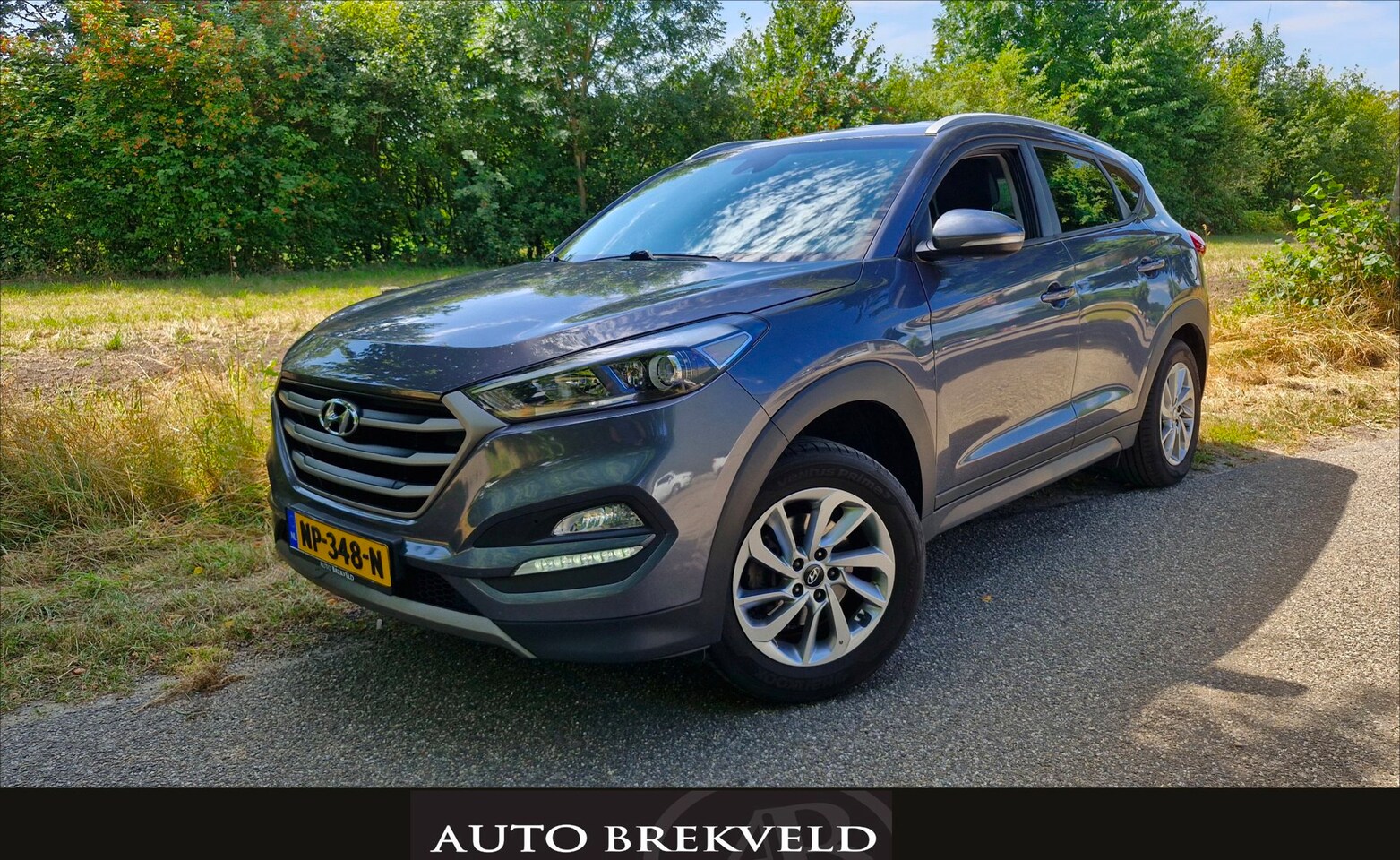 Hyundai Tucson - 1.6 GDi i-Motion 132PK | Rijklaar | Cruise | Clima | Camera | Navi | LMV - AutoWereld.nl
