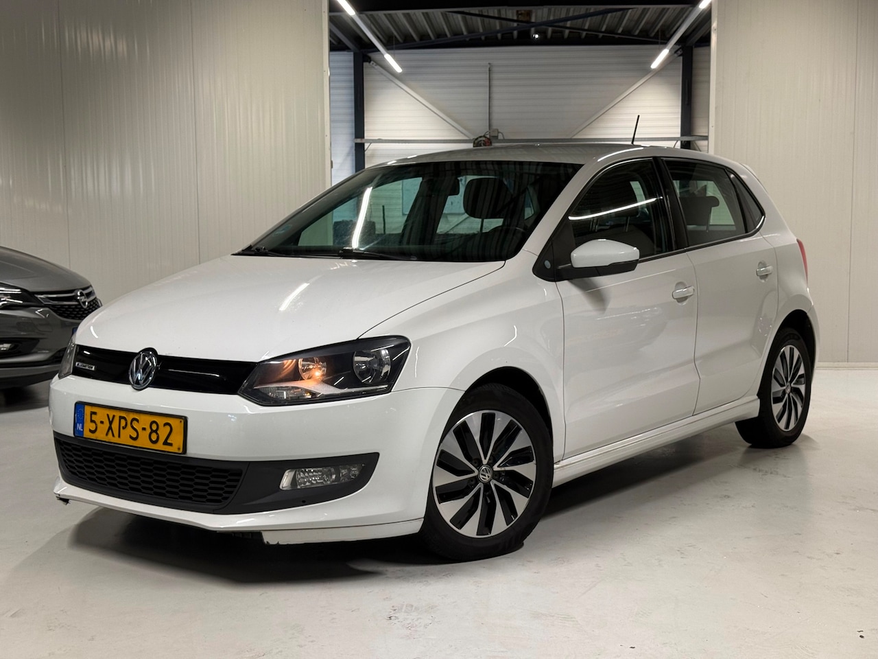 Volkswagen Polo - 1.4 TDI BlueMotion Airco|Navigatie|2014! - AutoWereld.nl
