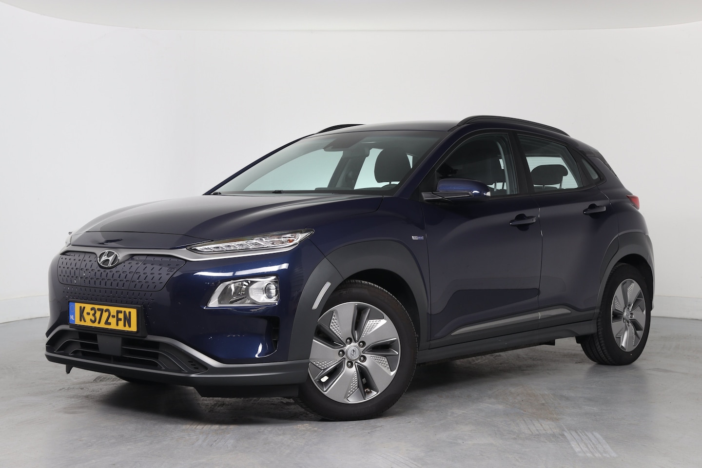 Hyundai Kona Electric - EV Comfort 64 kWh | Warmtepomp | Trekhaak | Camera | Cruise Adaptive | Navi | Clima | Keyl - AutoWereld.nl