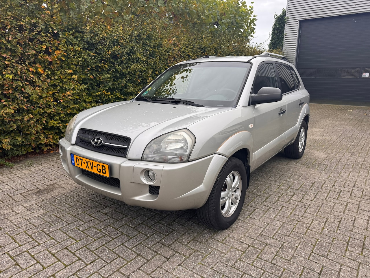 Hyundai Tucson - 2.0i Dynamic Cross - AIRCO - PARK SENSOR - 1ste EIGN - ORG NL NAP - AutoWereld.nl