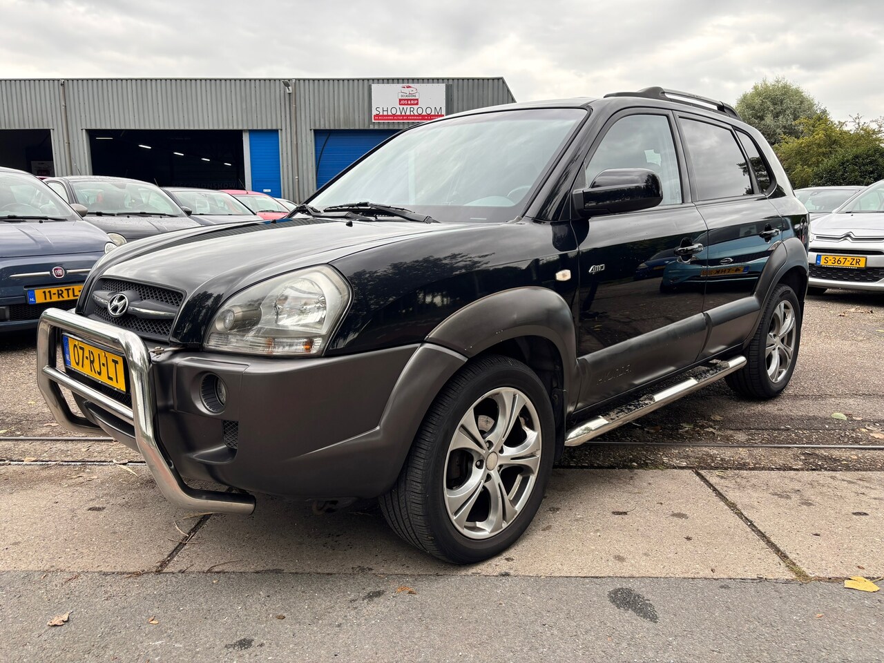 Hyundai Tucson - 2.7i V6 4WD Style 2.7i V6 4WD Style - AutoWereld.nl