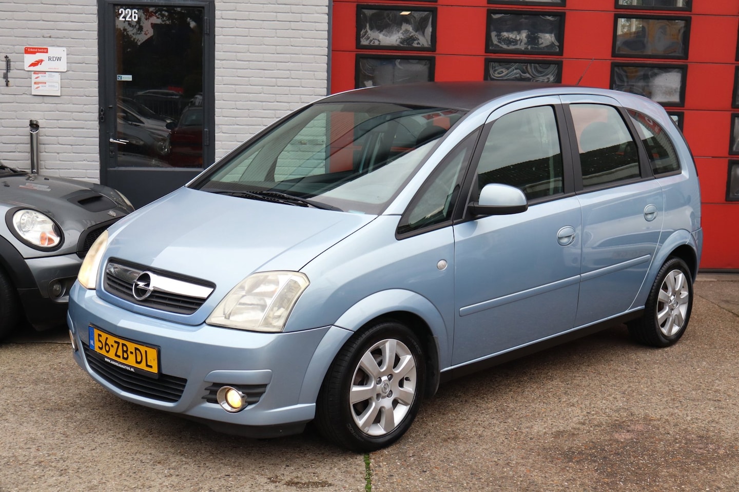 Opel Meriva - 1.4-16V Cosmo 1.4-16V Cosmo ,Airco, Elek pakket, Sportvelgen - AutoWereld.nl
