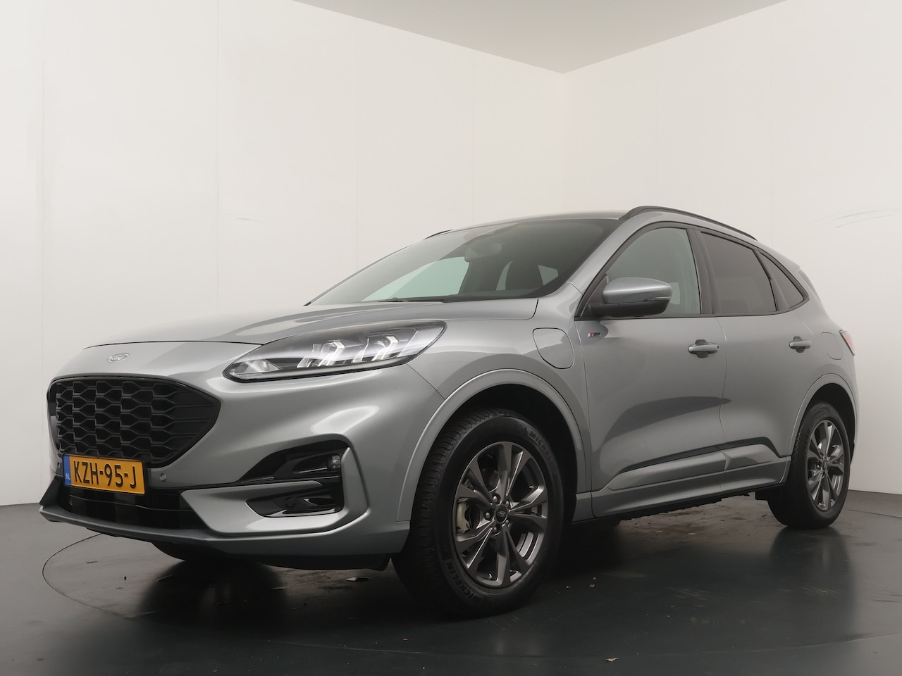 Ford Kuga - 2.5 PHEV ST-Line | Winter Pack | Camera | Navi | Clima | Cruise | 4 Seiz. banden | SOH 95, - AutoWereld.nl