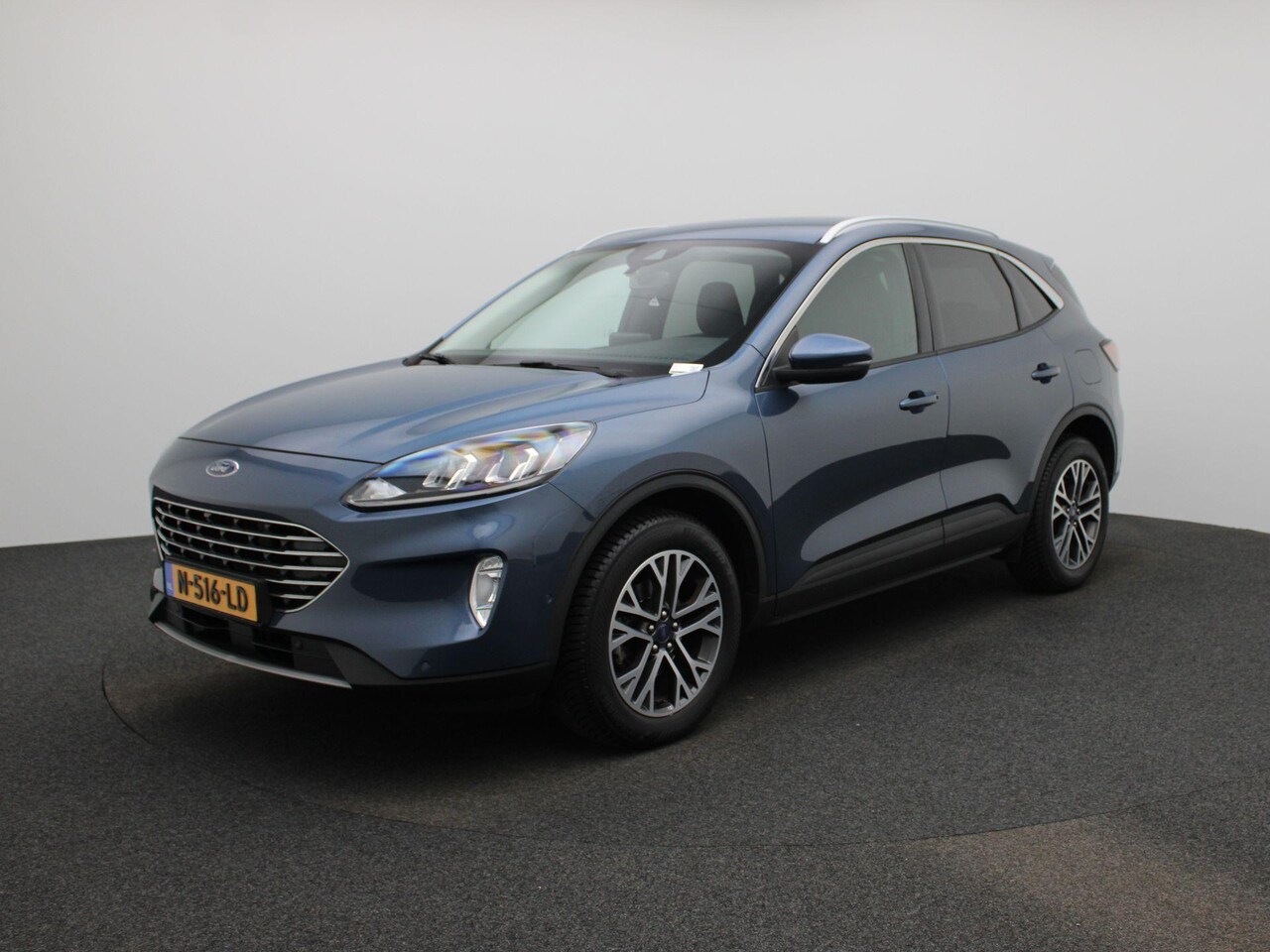 Ford Kuga - 1.5 EcoBoost Titanium 150pk | Adaptieve cruise controle | Parkeer Camera Voor & achter | 1 - AutoWereld.nl