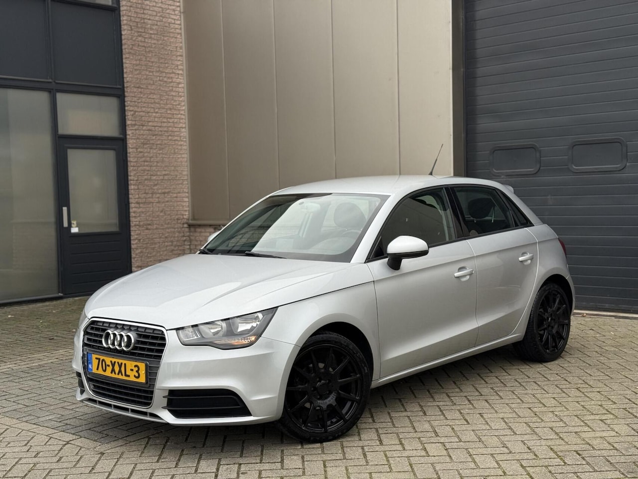 Audi A1 Sportback - 1.2 TFSI Attraction Airco/Cruise/BT - AutoWereld.nl