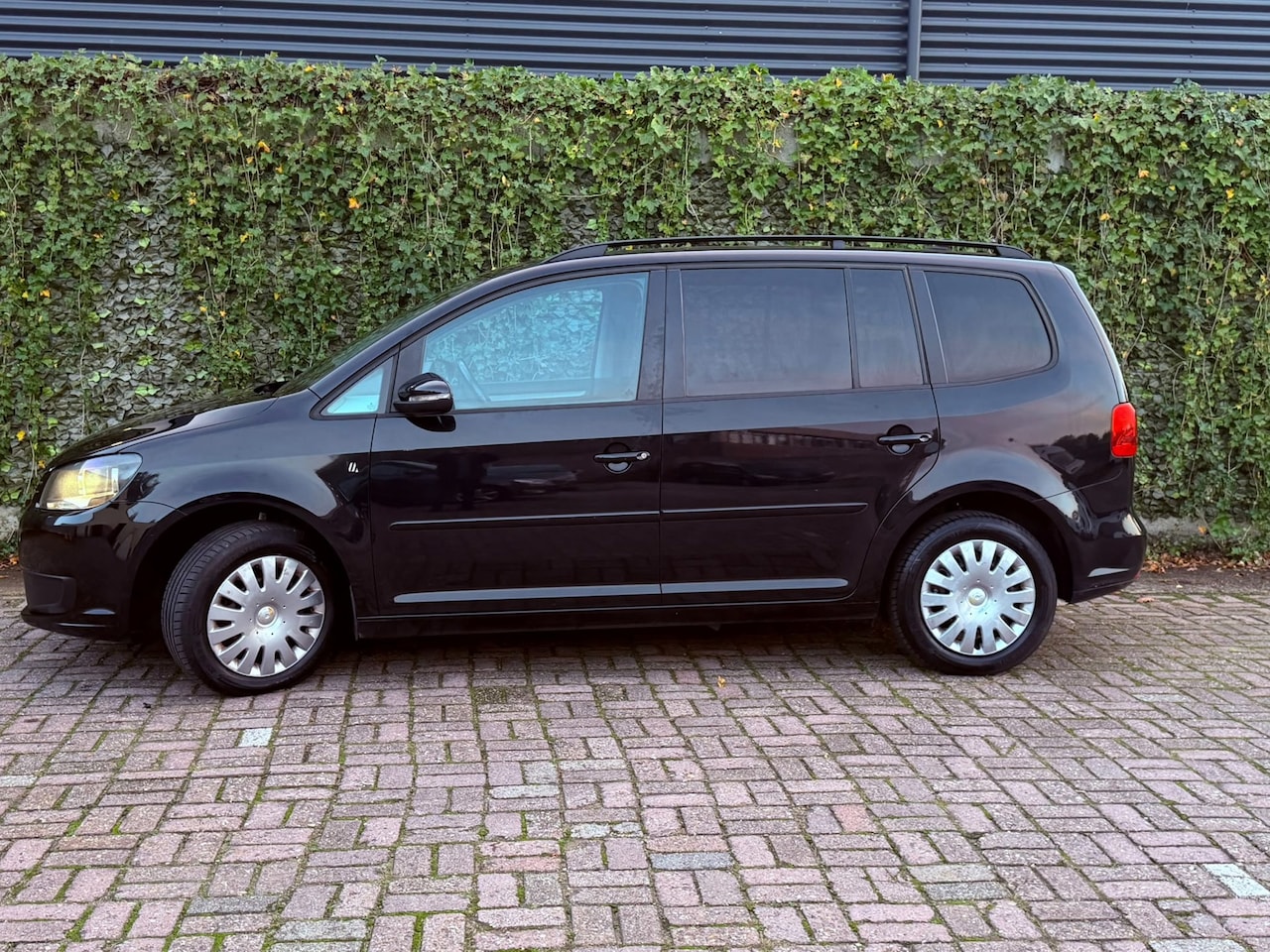 Volkswagen Touran - 1.2 TSI Comfortline BlueMotion 7p. 1.2 TSI Comfortline BlueMotion 7p. - AutoWereld.nl