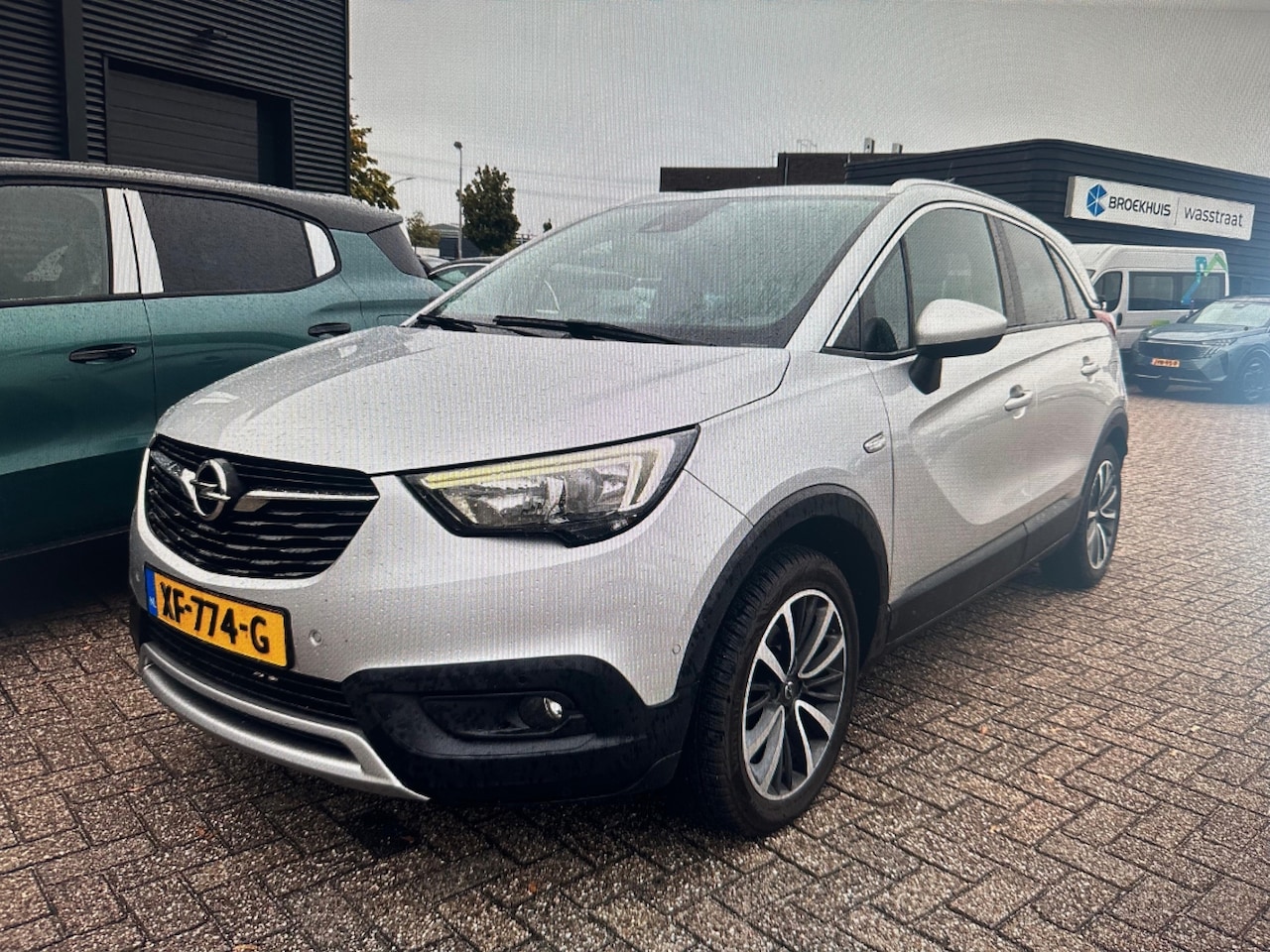 Opel Crossland X - 1.2 Turbo Online Edition/AUTOMAAT/Navi/Clima/LM-velgen/half-leder/privacy-glass/dealer-ond - AutoWereld.nl