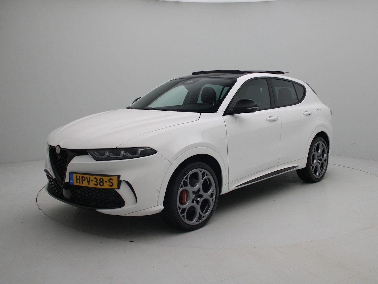 Alfa Romeo Tonale - 1.3T PHEV Tributo Italiano | Parkeercamera 360° | Harman-Kardon Soundsystem | Panoramisch - AutoWereld.nl
