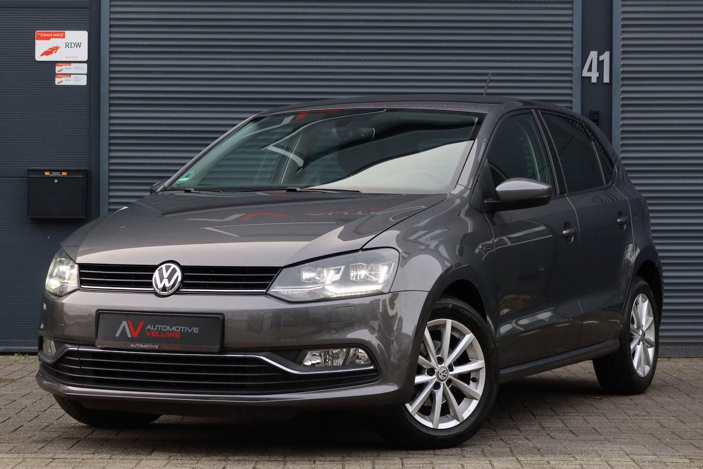 Volkswagen Polo - 1.2 TSI Dsg Lounge Edition Led|Cruise|Carplay|Stoelverw|Clima - AutoWereld.nl