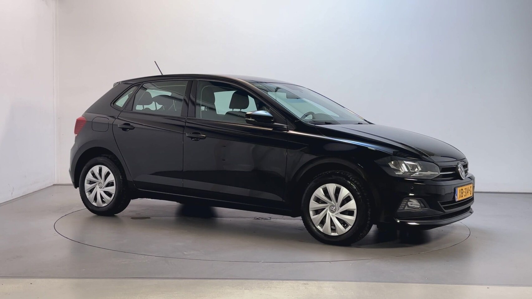 Volkswagen Polo - 1.0 TSI Comfortline Parkeersensoren Navigatie Airco Adaptive Cruise - AutoWereld.nl