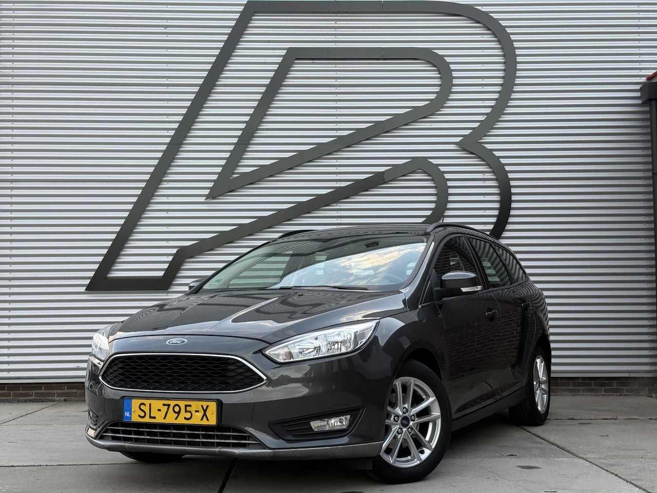 Ford Focus Wagon - 1.0 Lease Edition 2e Eigenaar|Navi|Trekhaak|Cruise|Clima|PDC|N.A.P|Nieuwe APK bij Afleveri - AutoWereld.nl
