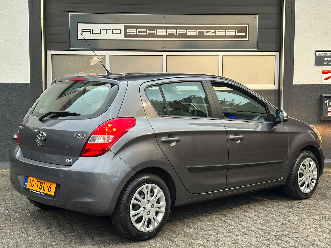 Hyundai i20 - 1.2i i-Motion | AIRCO | 92.892 km | NL AUTO | ZUINIG - AutoWereld.nl