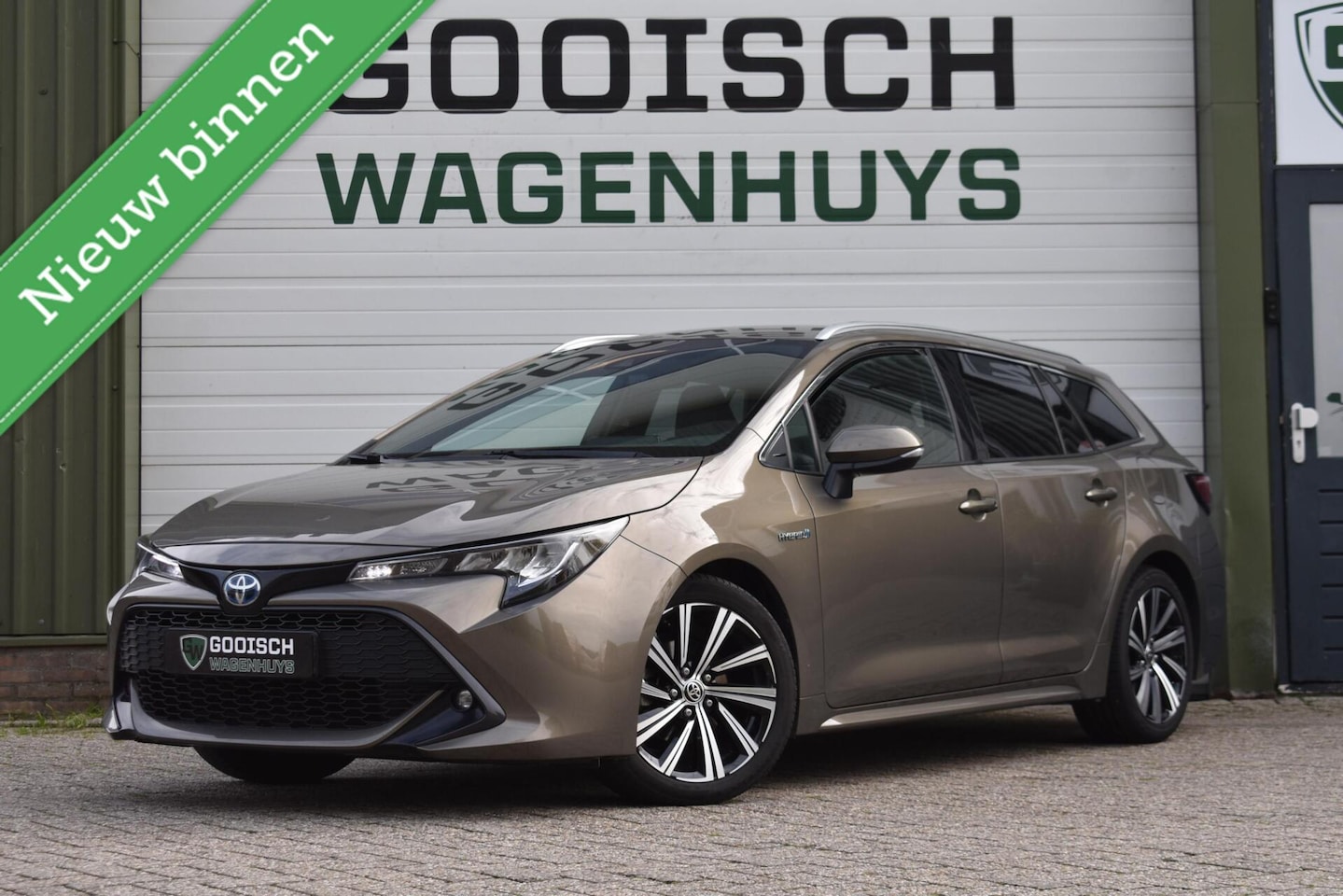 Toyota Corolla Touring Sports - 1.8 Hybrid Business Plus | Carplay | Stoelverwarming | Camera | - AutoWereld.nl