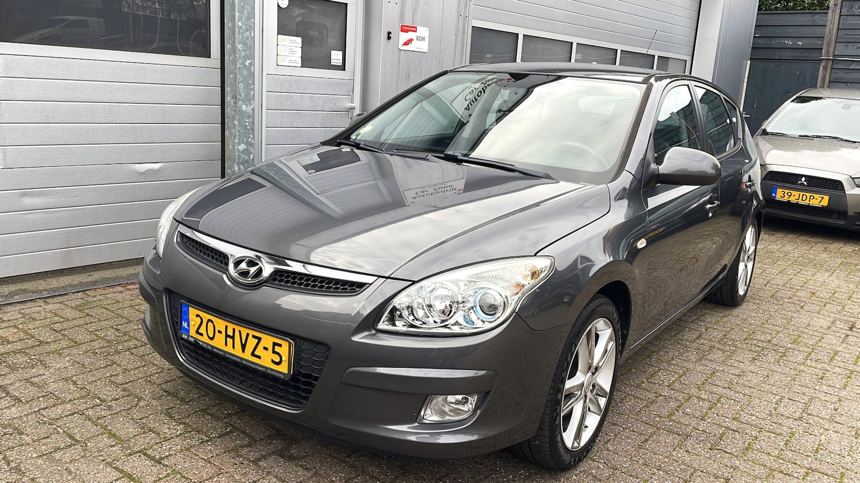 Hyundai i30 - 1.6i i-Catcher-Leder-Clima-Velgen-Trekhaak-APK - AutoWereld.nl