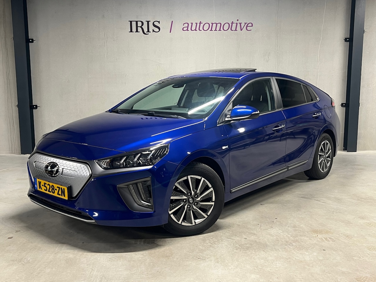 Hyundai IONIQ - Premium EV 38 kWh - SOH 98,5% - Schuifdak - Stoelventilatie - ACC - Camera - Cl Control - - AutoWereld.nl