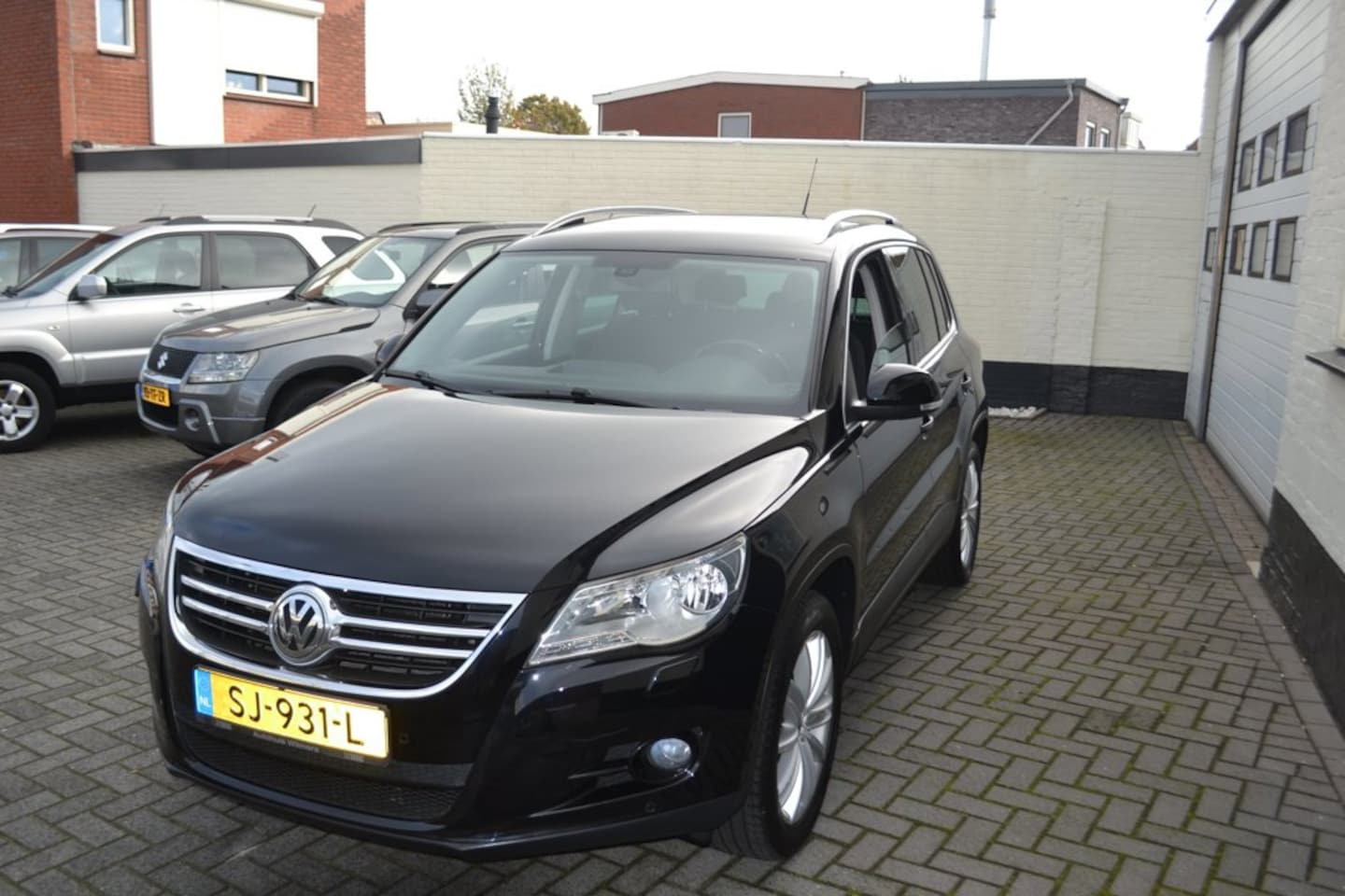 Volkswagen Tiguan - 1.4 TSI Easyline Xenon/Chroomline/Cruise - AutoWereld.nl