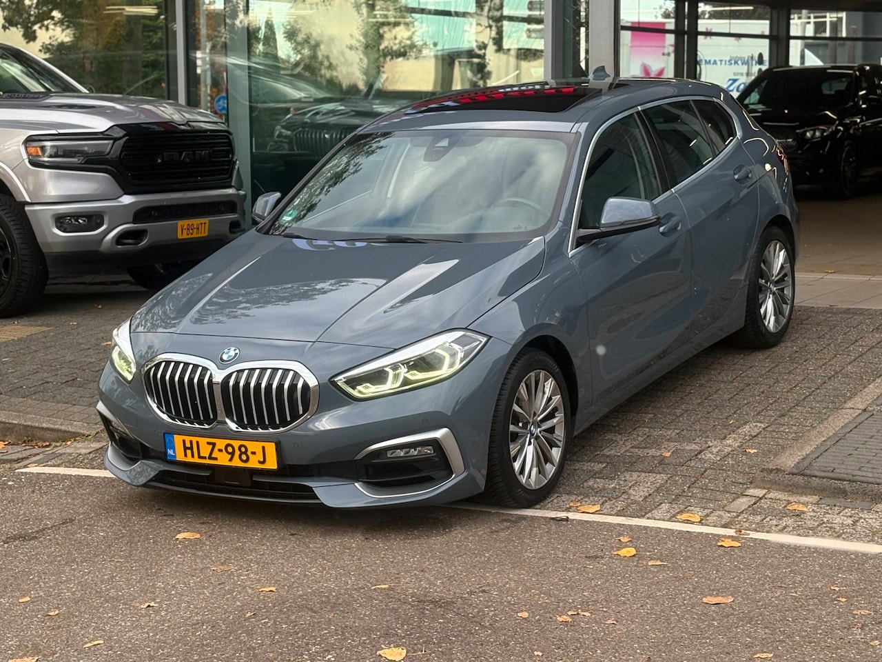 BMW 1-serie - 118i High Executive PANO-DAK AUTOMAAT! - AutoWereld.nl