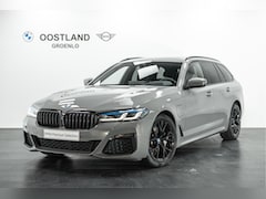BMW 5-serie Touring - 520e High Executive M Sport Automaat / Panoramadak / Laserlight / Head-Up / Comfortstoelen