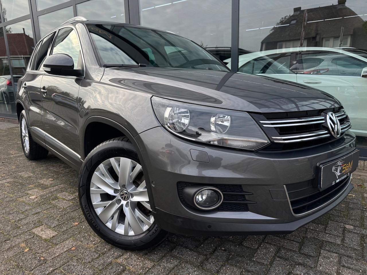 Volkswagen Tiguan - 1.4 TSI Sport&Style R-line Edition - AutoWereld.nl