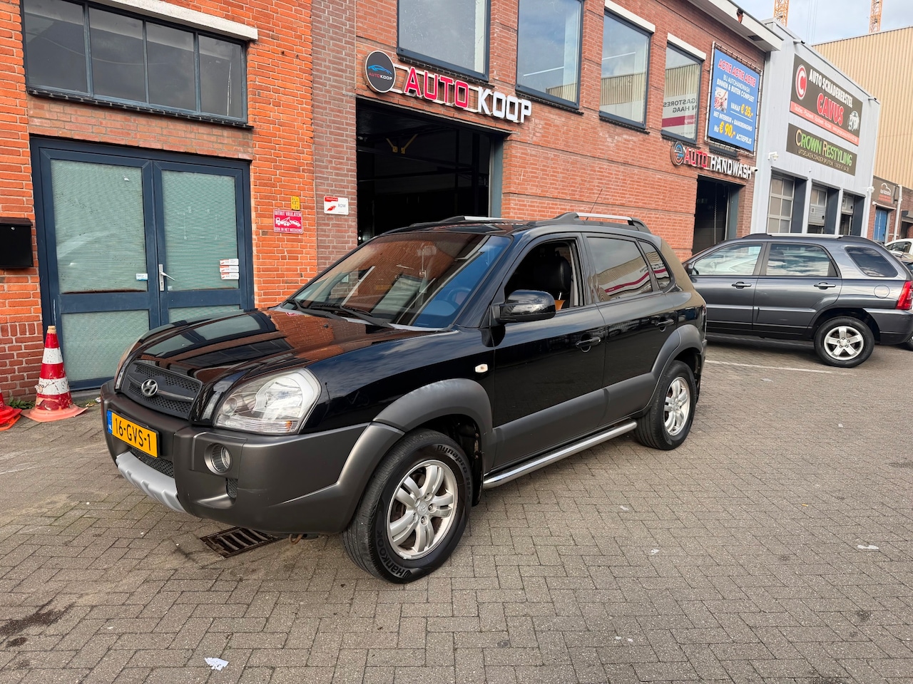 Hyundai Tucson - 2.0i Style Cross Leder Clima Cruise Export - AutoWereld.nl