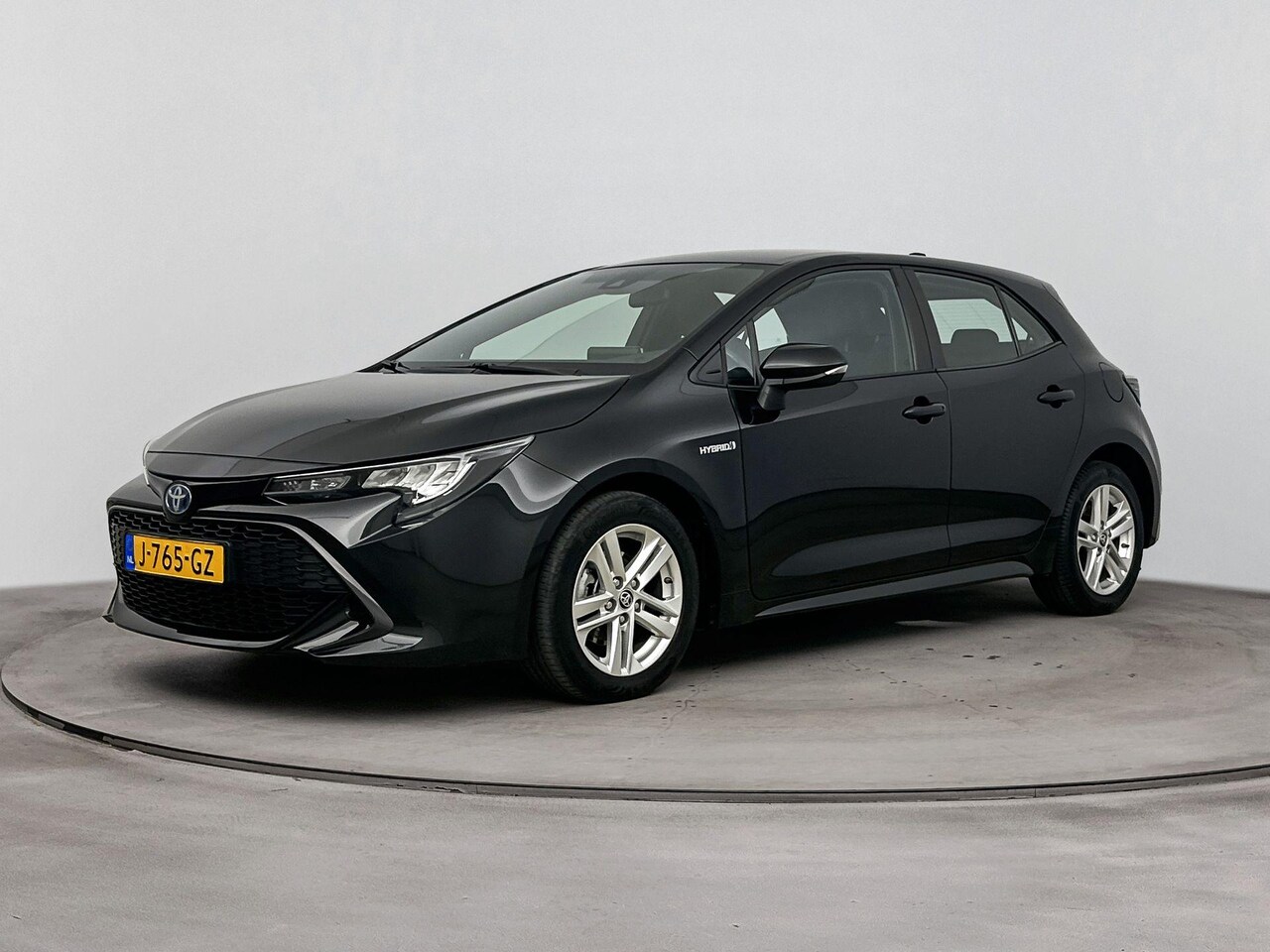 Toyota Corolla - 1.8 HYBRID ACTIVE | CLIMA | CRUISE ADAPT. | CAMERA | NAVI | HYBRID | AUTOMAAT | 16'' LM VE - AutoWereld.nl