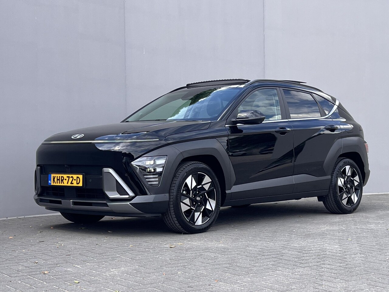 Hyundai Kona - 1.6 GDI HEV Premium Sky / Fabrieksgarantie tot 10-2028 / Schuifdak / Leder / Camera 360° / - AutoWereld.nl