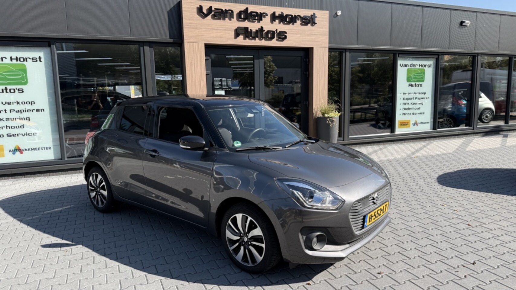 Suzuki Swift - 1.0 Stijl automaat airco - AutoWereld.nl