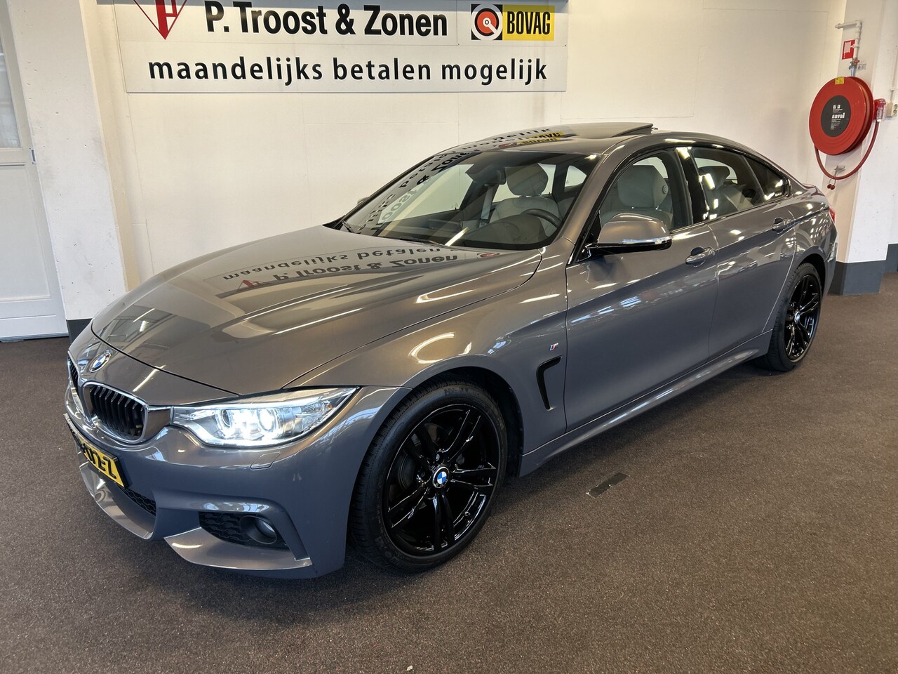 BMW 4-serie Gran Coupé - 418i Individual M-pakket Schuifkanteldak/Automaat/Navigatie/Climate controle/Cruise cotrol - AutoWereld.nl