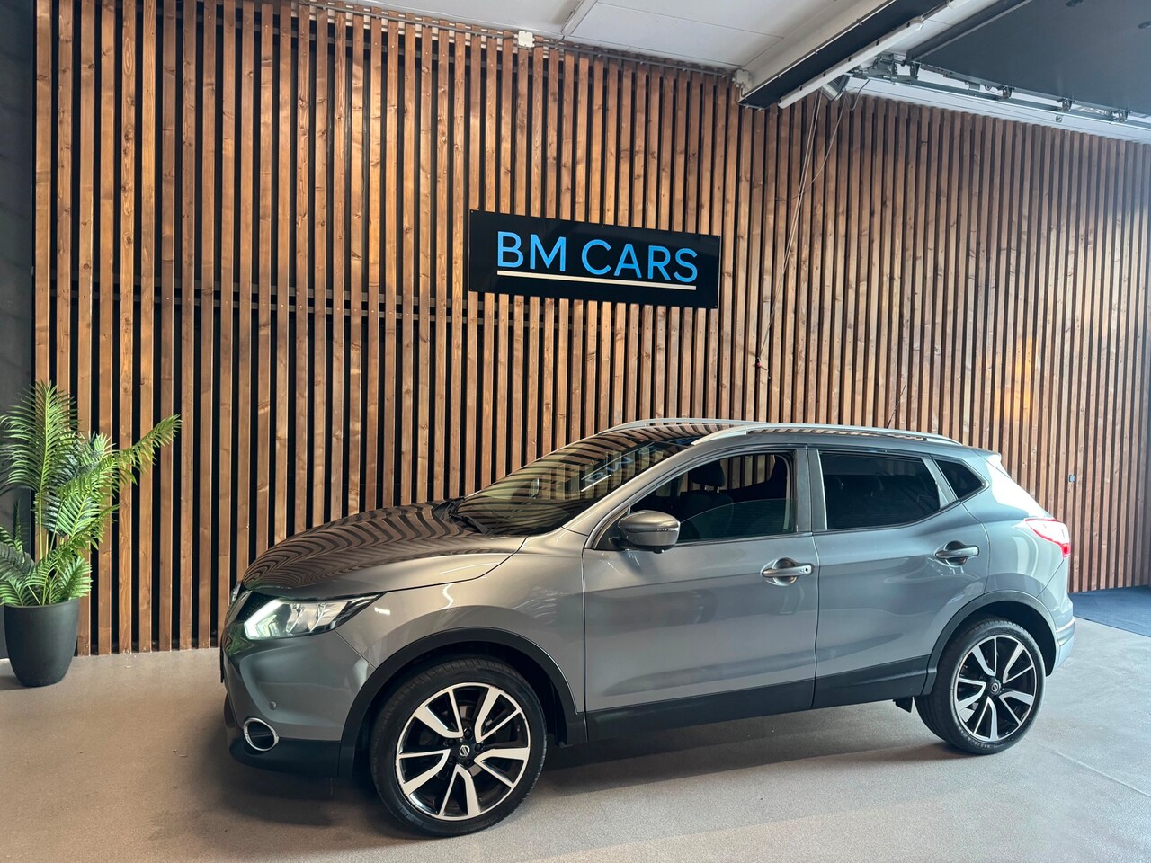Nissan Qashqai - 1.2 N-Connecta Panodak,Xenon,Camera,Trkhaak - AutoWereld.nl
