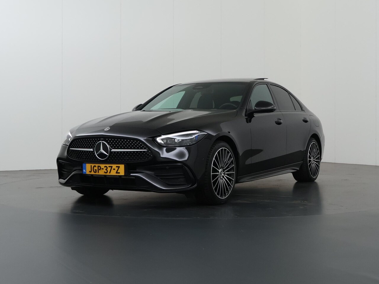 Mercedes-Benz C-klasse - 300 de Business Solution AMG | Night | Panoramadak | Memory | Digital Light | Sfeerverlich - AutoWereld.nl