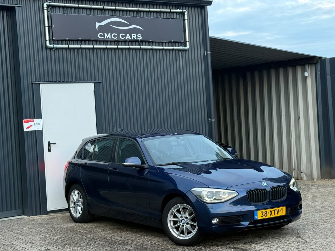 BMW 1-serie - 116i Upgrade Edition AUTOMAAT!! XENON!! RIJDT NIEUW!! - AutoWereld.nl