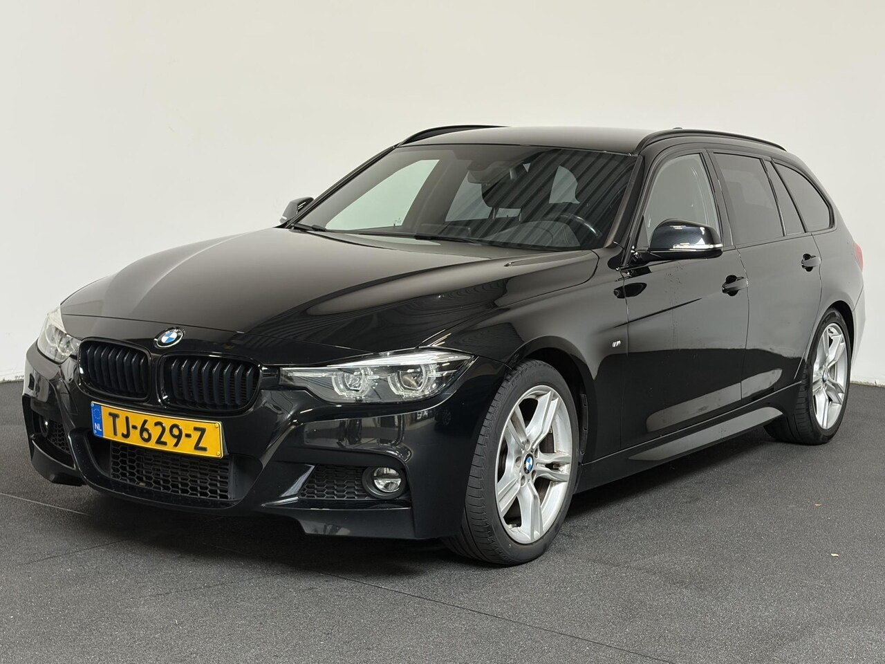 BMW 3-serie Touring - 318i M Sport Edition Navigatie Climate control Lederen bekleding - AutoWereld.nl