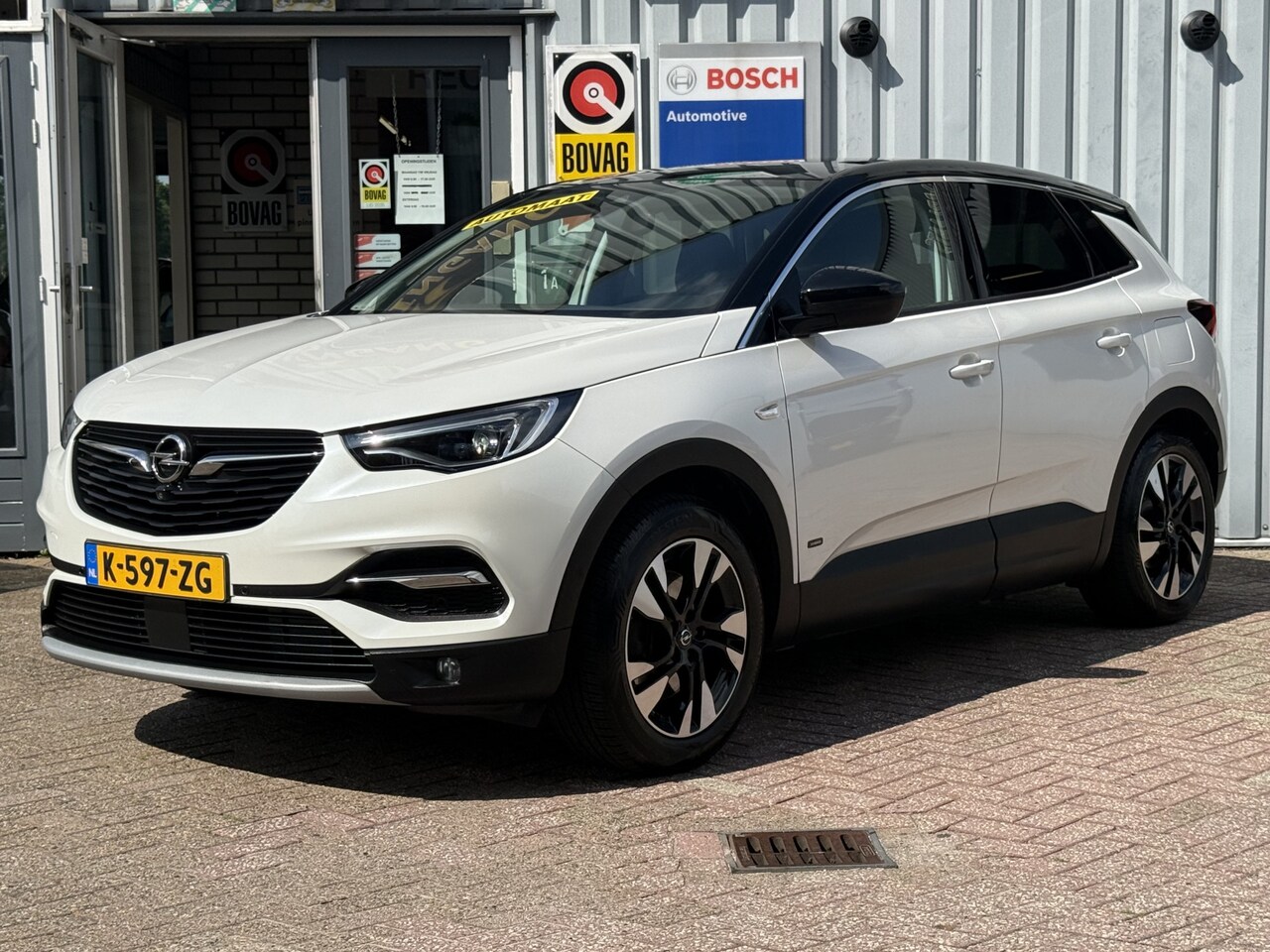 Opel Grandland X - 1.6 Turbo Hybrid Business Elegance 181pk | TREKHAAK | CAMERA | NAVI | FULL LED | PARELMOER - AutoWereld.nl