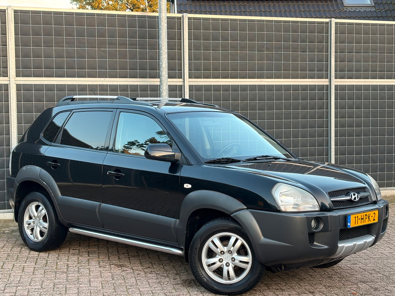 Hyundai Tucson - 2.0i Style Cross 2.0i Style Cross - AutoWereld.nl