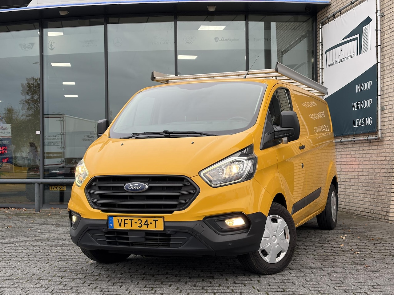 Ford Transit Custom - 320 2.0 TDCI L2H1*OMVORMER*HAAK*A/C*CRUISE*PDC*TEL - AutoWereld.nl