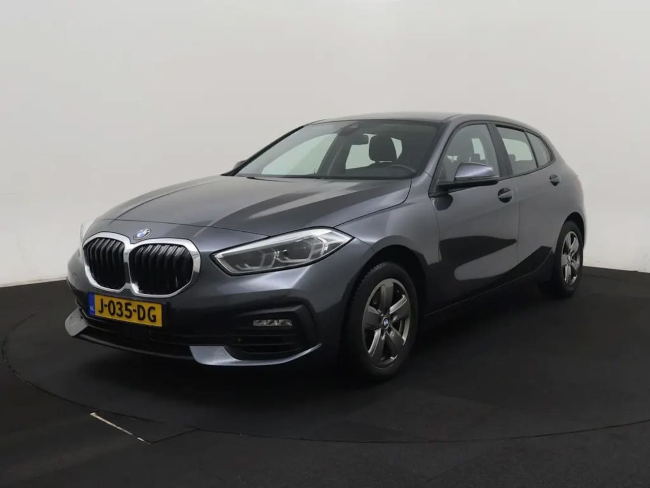 BMW 1-serie - 118i Executive Edition (LED, CRUISE, NAVI, GOED ONDERHOUDEN) - AutoWereld.nl