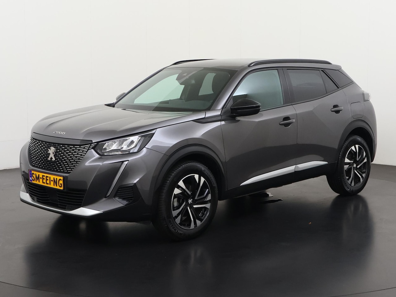 Peugeot 2008 - 1.2 PureTech Allure Pack Automaat | All-in 453,- Private Lease | Direct uit voorraad - AutoWereld.nl