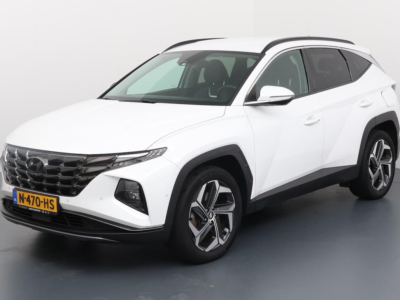 Hyundai Tucson - 1.6 T-GDI HEV PREMIUM I AUTOMAAT I TREKHAAK I 360 CAMERA I APPLE CARPLAY I CLIMATE CONTROL - AutoWereld.nl