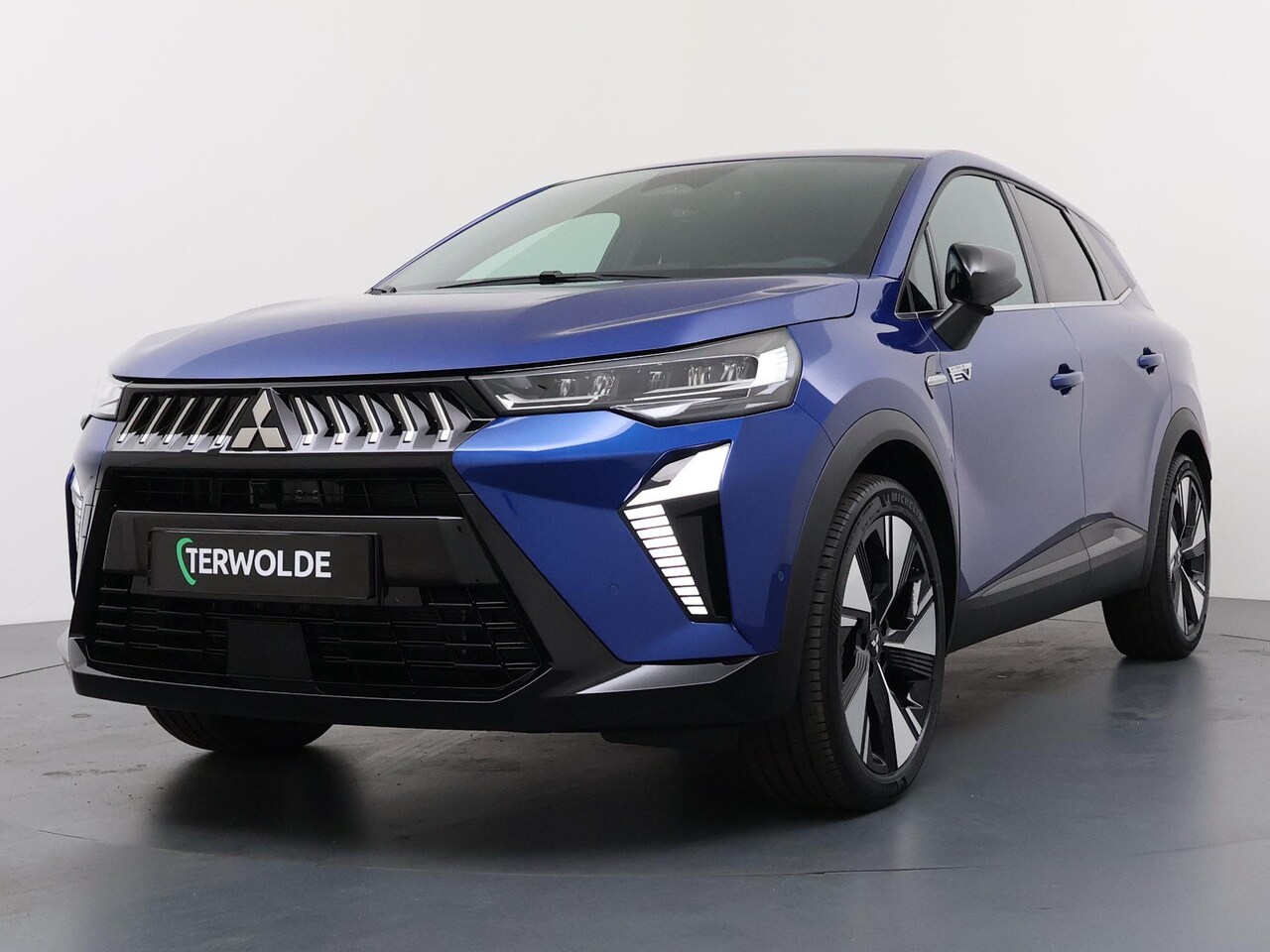 Mitsubishi Grandis - 1.8 HEV First Edition €3.000 Voorraadvoordeel | Google Build-in | rondom-camera | Stoelver - AutoWereld.nl